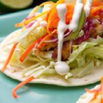 Zesty Fish Tacos with Fresh Lime Cabbage Slaw Delight