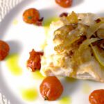 Garlic Herb Baked Cod with Juicy Blistered Tomatoes Delight