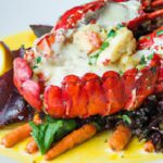 Savor Elegance: Cardamom-Butter Lobster in Saffron Nage
