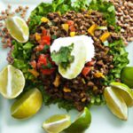 Hearty Lentil Walnut Taco Salad with Zesty Lime Crema Twist